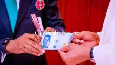 CBN Governor Godwin Emefiele and President Muhammadu Buhari Unveiling New Naira Note - Credible News